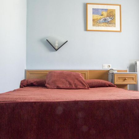 Hotel Rausan Alfajarín Oda fotoğraf