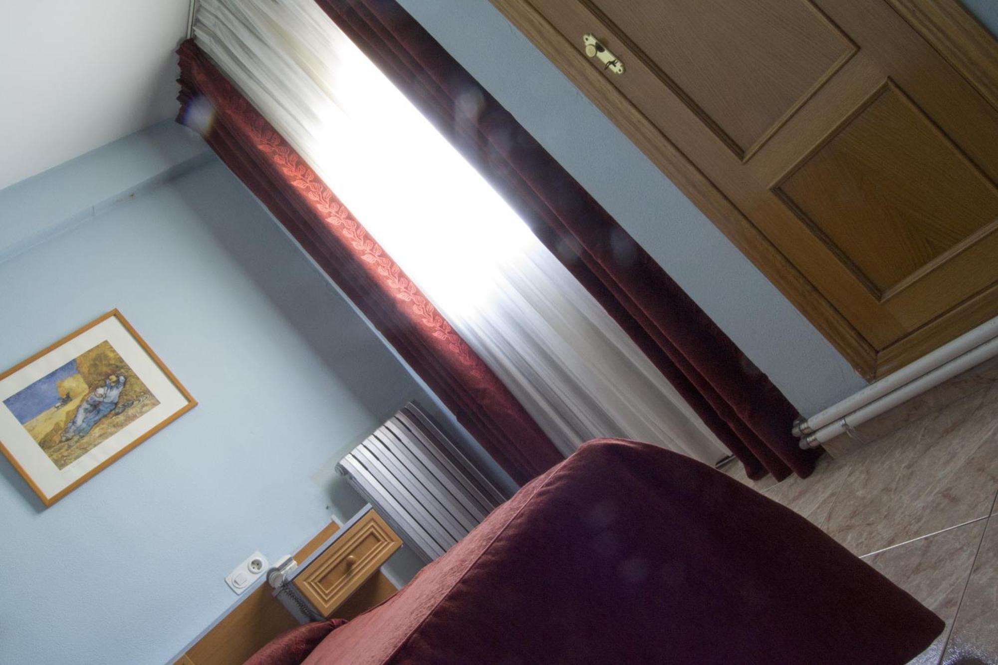 Hotel Rausan Alfajarín Oda fotoğraf